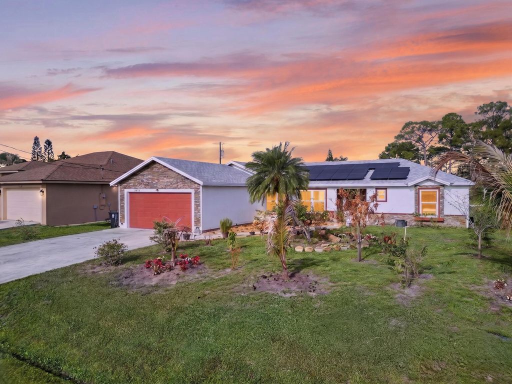 Photo of 3472 SW Europe Street, Port Saint Lucie, FL 34953 (MLS # B26020242)