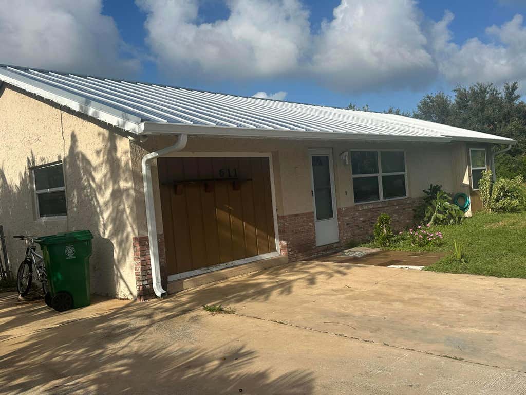 Photo of 611 SW Port St Lucie Boulevard S, Port Saint Lucie, FL 34953 (MLS # R11063783)