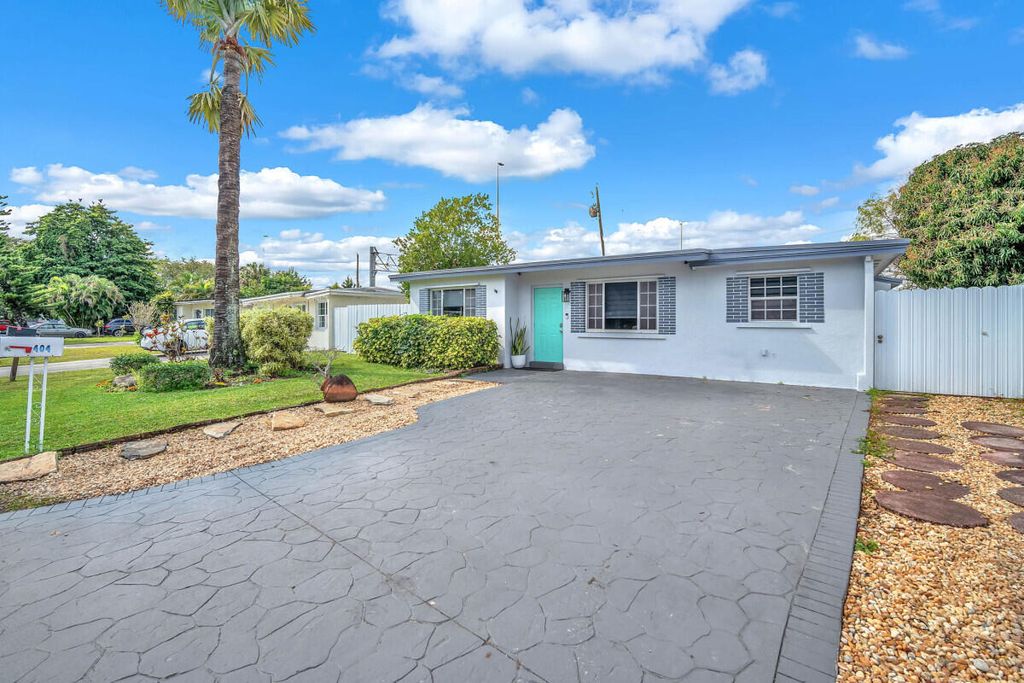 Photo of 404 S 62nd Terrace, Hollywood, FL 33023 (MLS # B26045209)