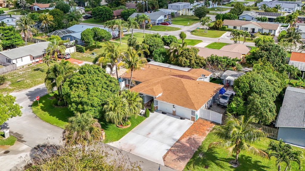 Photo of 3119 Indian Trail, Lake Worth, FL 33462 (MLS # B26023564)