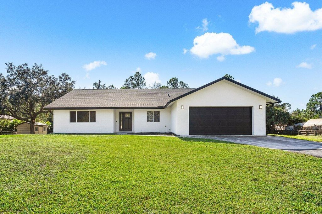 Photo of 13884 47th Court N, West Palm Beach, FL 33411 (MLS # R10944314)