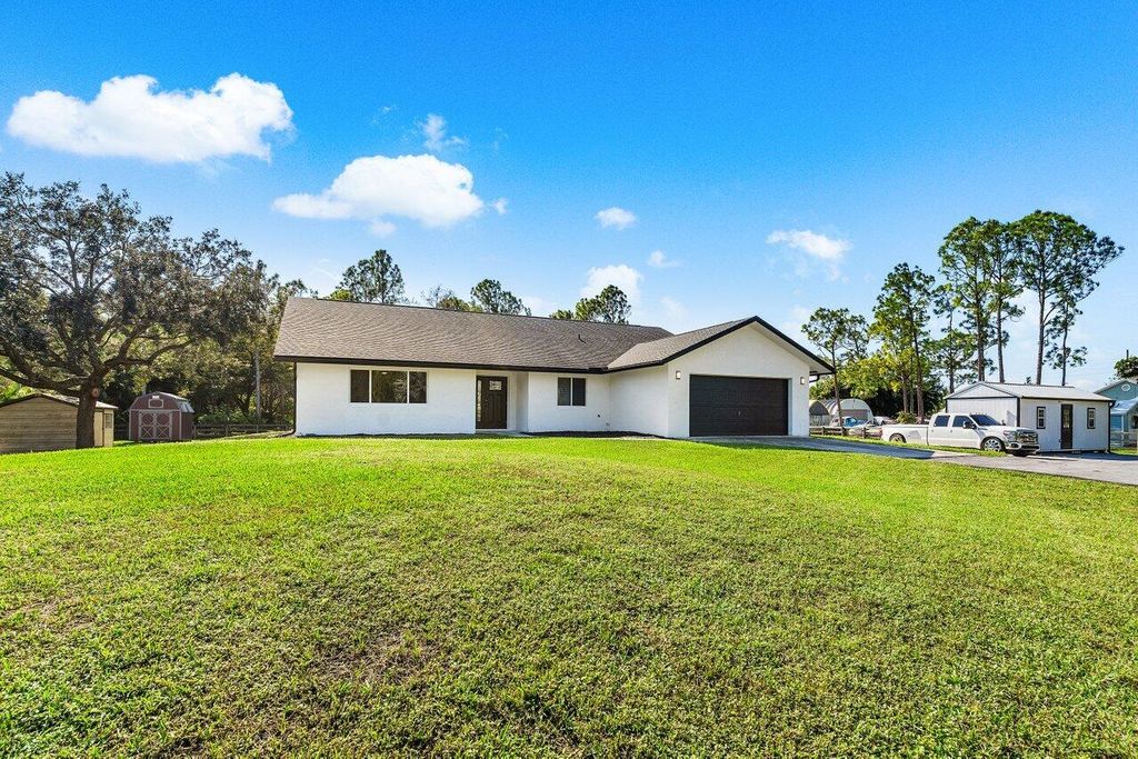 Photo of 13884 47th Court N, West Palm Beach, FL 33411 (MLS # R10944314)