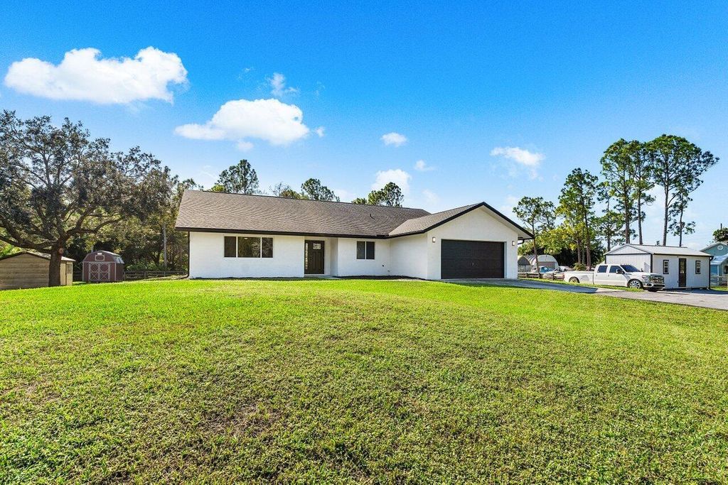 Photo of 13884 47th Court N, West Palm Beach, FL 33411 (MLS # R10944314)