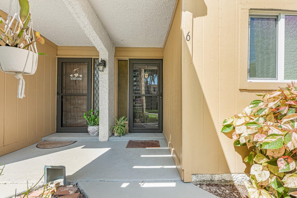 Photo of 1500 NE 13th Terrace #G6, Jensen Beach, FL 34957 (MLS # B26039172)