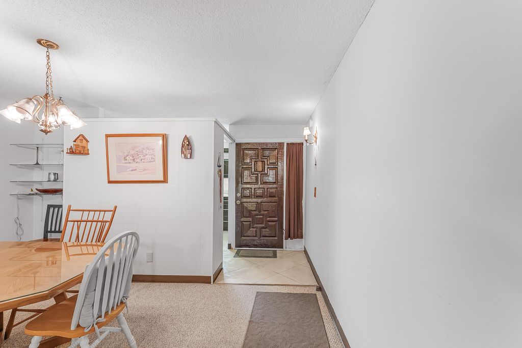 Photo of 1500 NE 13th Terrace #G6, Jensen Beach, FL 34957 (MLS # B26039172)
