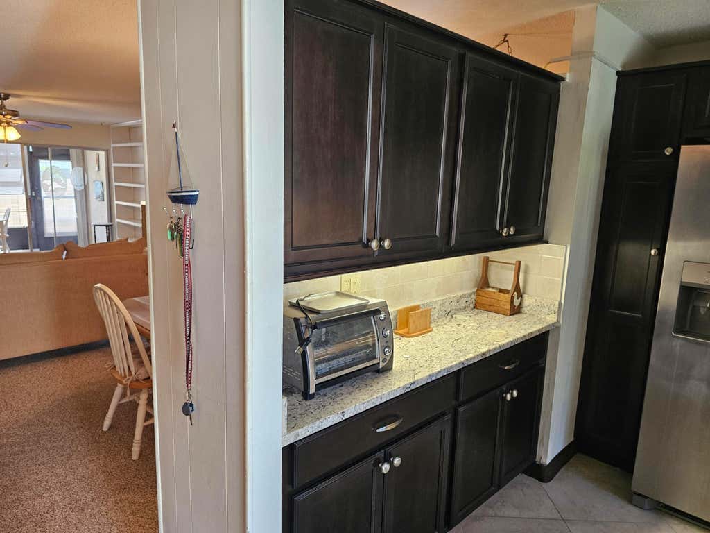 Photo of 1500 NE 13th Terrace #G6, Jensen Beach, FL 34957 (MLS # B26039172)