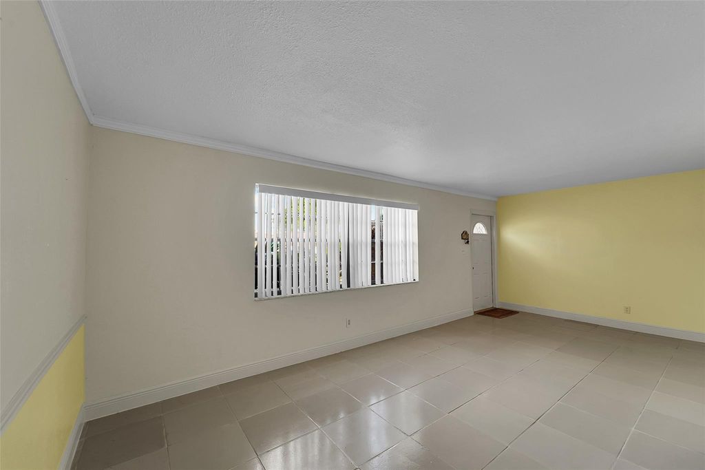 Photo of 12 Meacham Ln #12, Tamarac, FL 33319 (MLS # F10540178)