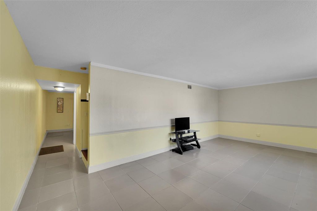 Photo of 12 Meacham Ln #12, Tamarac, FL 33319 (MLS # F10540178)