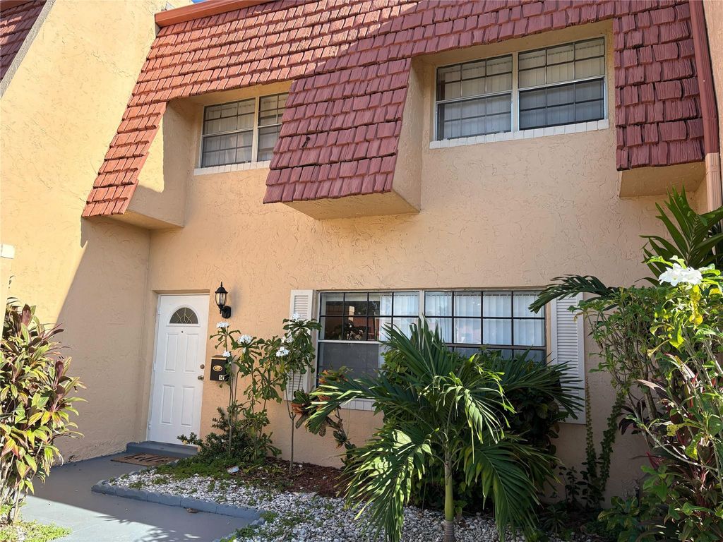 Photo of 12 Meacham Ln #12, Tamarac, FL 33319 (MLS # F10540178)