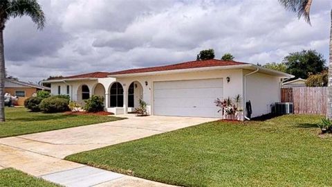 Photo of 201 NE Midfield Lane, Port Saint Lucie, FL 34983 (MLS # B26024750)