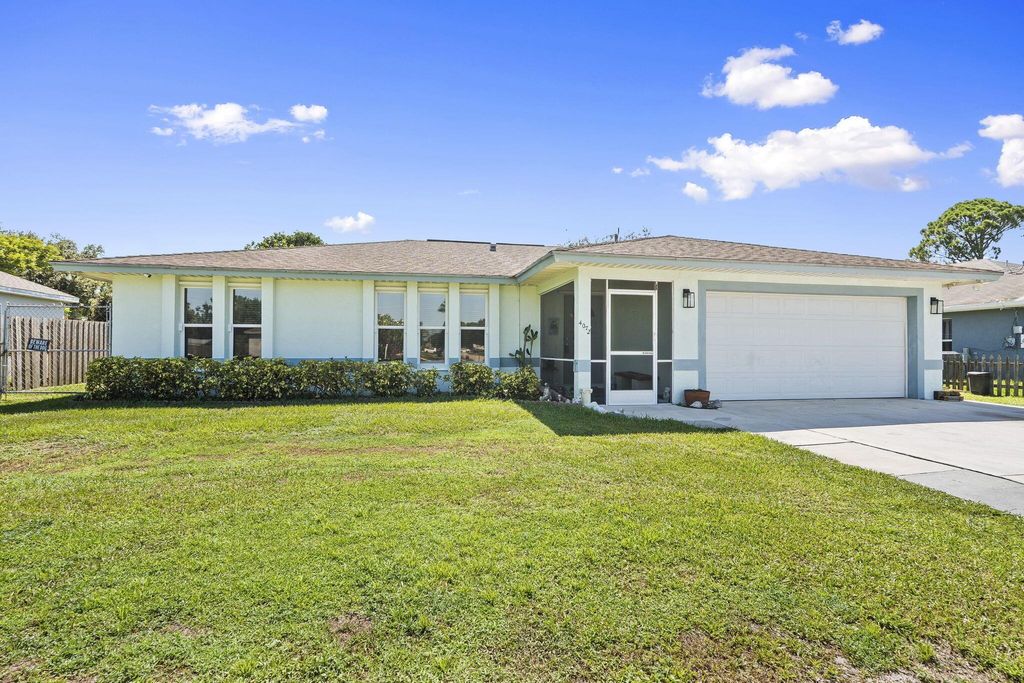 Photo of 4072 SW Carlile Street, Port Saint Lucie, FL 34953 (MLS # R11110535)