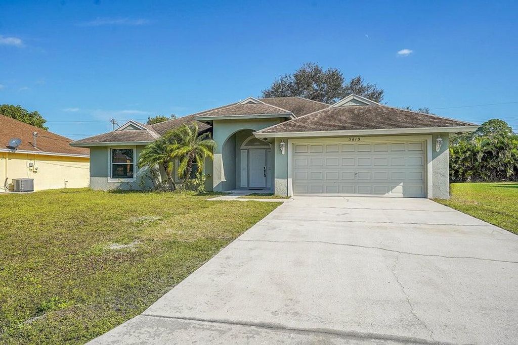 Photo of 3615 SW Foremost Drive, Port Saint Lucie, FL 34953 (MLS # R11059194)