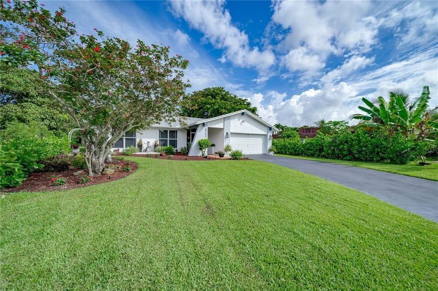 Impact Windows, Roof 2021, AC 2018, WH 2021, newer appliances.  Cul De Sac home located in the upscale Woodlands area in Tamarac. This large 2300SF  home has 3 bed, 2 bath, 2 car garage. A very large patio / family room, large enough to add a 4th bedroom or an office. The home is fully renovated, Newer kitchen, newer Wood  flooring throughout the home. Newly built out door kitchen (Gas & Electric).  Screened Patio, Huge private back yard with fruit trees,  Extra long driveway that can fit up to 6 cars. Short distance to the pool, club house  and golf course. Very Low HOA!