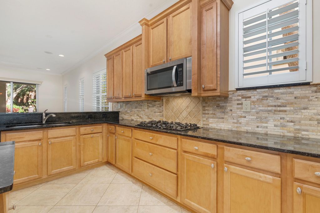 Photo of 957 Mill Creek Drive, Palm Beach Gardens, FL 33410 (MLS # R11163457)