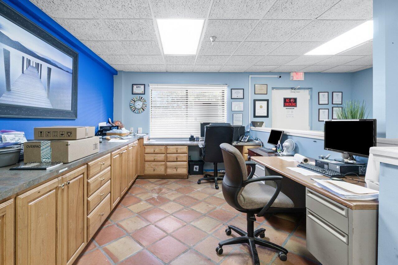 This property is located in Central West Palm Beach. The second floor includes a private entrance in the rear of the building. The tenant can utilize the main entrance and receptionist on the first floor. The space includes two private offices, a kitchen/breakroom (no plumbing, just cabinets and refrigerator), which can also be utilized as a third office or small conference room, plus a bathroom with a shower. An IT closet and conference room are located on the first floor, both of which are shared with the property owner. Use of the receptionist and conference room are included in the base rent. There is one covered parking space available for the second floor tenant. All CAM charges are shared with the new Tenant.
