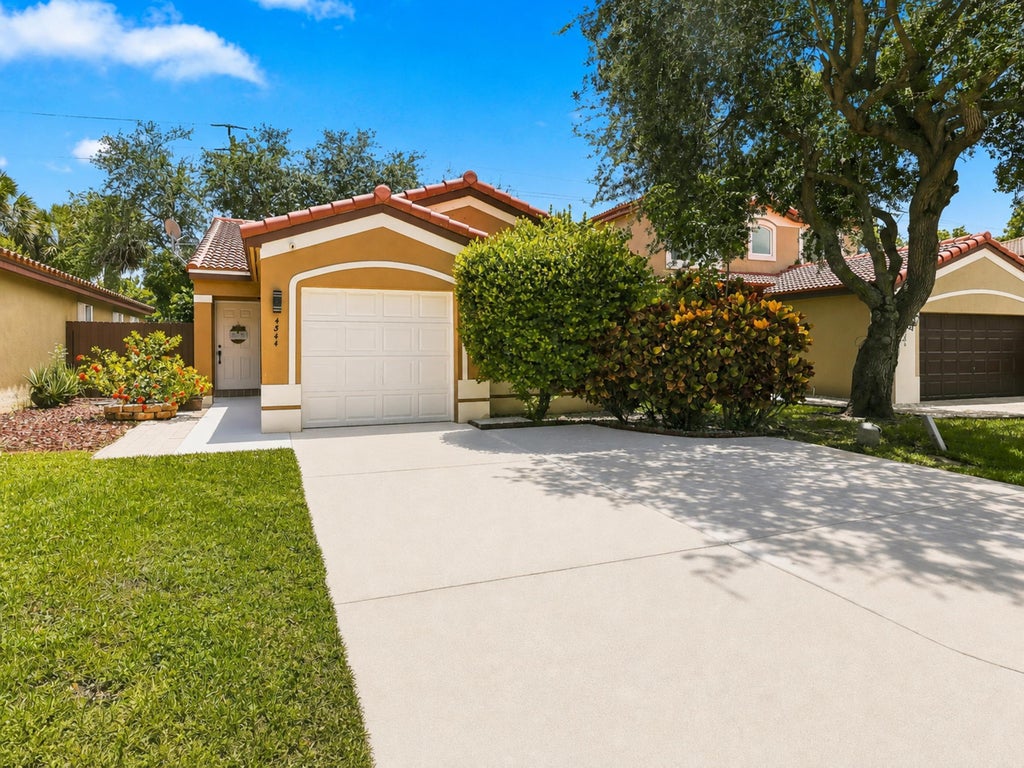 Photo of 4344 NW 1st Street, Deerfield Beach, FL 33442 (MLS # B26060923)