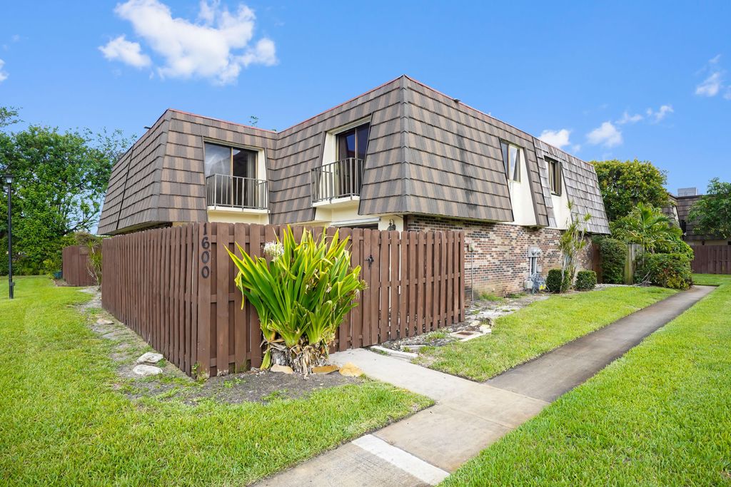 Photo of 1600 Forest Lakes Circle #D, West Palm Beach, FL 33406 (MLS # B26031372)