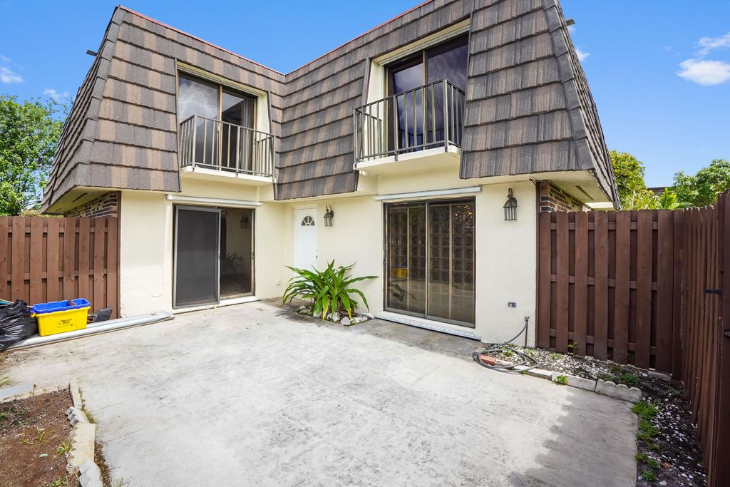 Photo of 1600 Forest Lakes Circle #D, West Palm Beach, FL 33406 (MLS # B26031372)