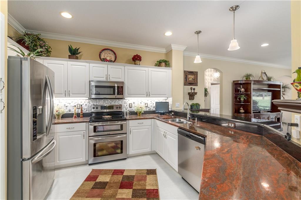 CLUBSIDE VILLAS AT BALLANTRAE, A CONDOMINIUM - Residential