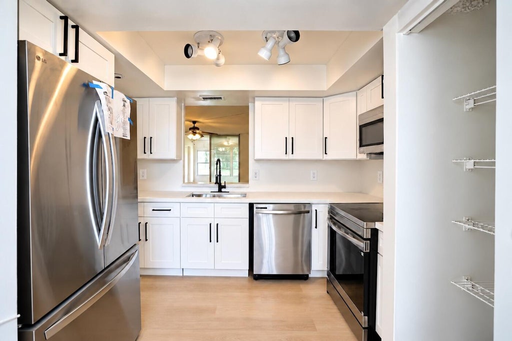 Photo of 950 NW 80TH Avenue #104, Margate, FL 33063 (MLS # B26081408)