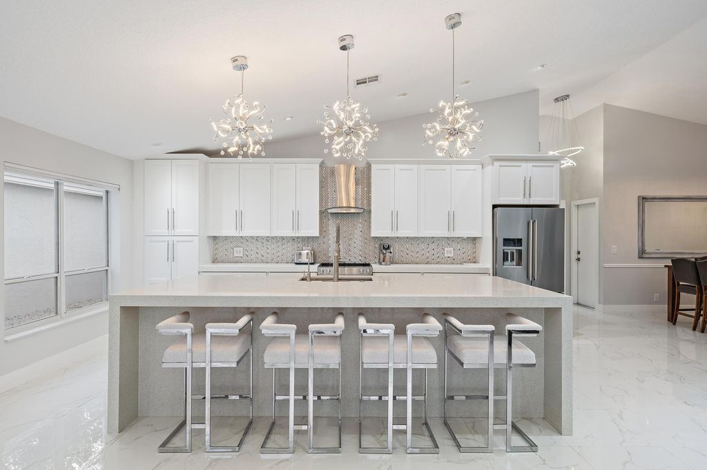 Photo of 1077 Siena Oaks Circle E, Palm Beach Gardens, FL 33410 (MLS # R11161348)