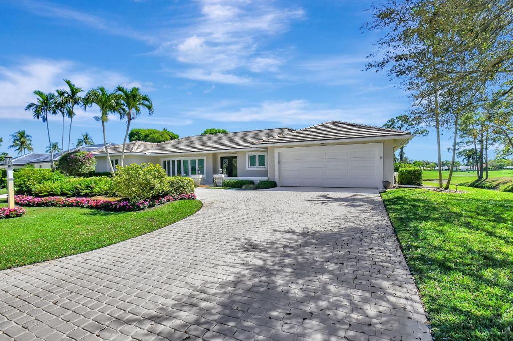 Photo of 11976 N Lake Drive, Boynton Beach, FL 33436 (MLS # R11067092)