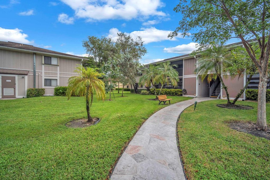 Photo of 10903 W Clairmont Cir #201, Tamarac, FL 33321 (MLS # F10531303)