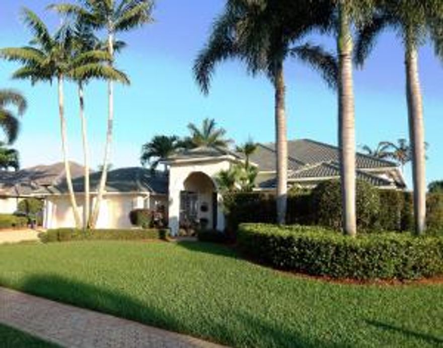 Immaculate, move-in ready home w/stunning lake views and lush landscaping. This home has it all, including a custom designed heated pool/spa w/Aqualink system, large screen-enclosed lanai, exotic engineered wood floors, vaulted ceilings, crown molding, granite counter tops, double oven, open kitchen/family room, custom built-in wall unit w/Bose sound system, 2 zone A/C, central vac, built-in closet organizers, 9 ceiling fans, plantation shutters & Silhouette blinds, exceptional landscaping and a lake fed sprinkler system. Hammock Creek is a gated community w/a Jack Nicklaus designed golf course & close to I-95, turnpike, beaches, shopping, and "A" rated schools. Furnishings sold separately. Sellers are licensed real estate agents.