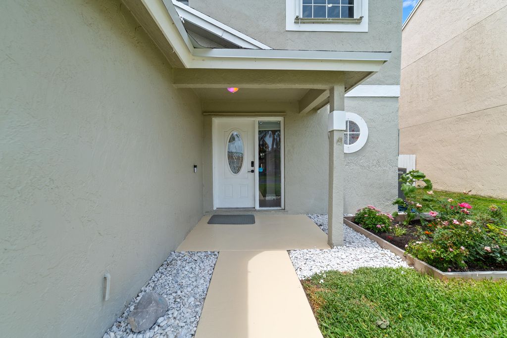 Photo of 1062 W Fairfax Cir CIR W, Boynton Beach, FL 33436 (MLS # B26026981)