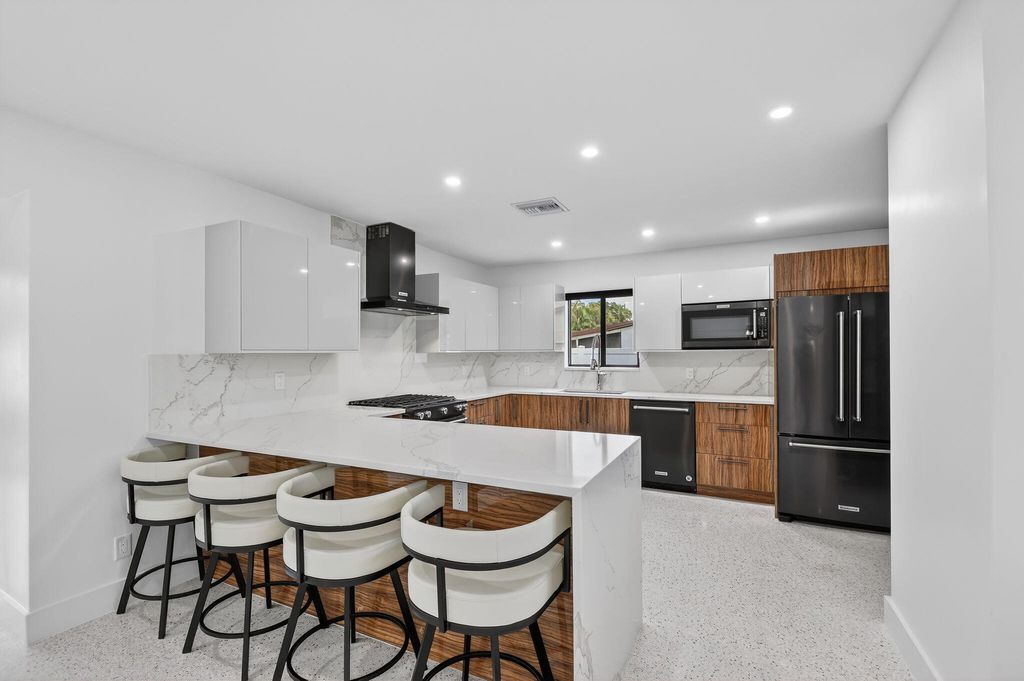 Photo of 504 Flotilla Road, North Palm Beach, FL 33408 (MLS # B26009969)