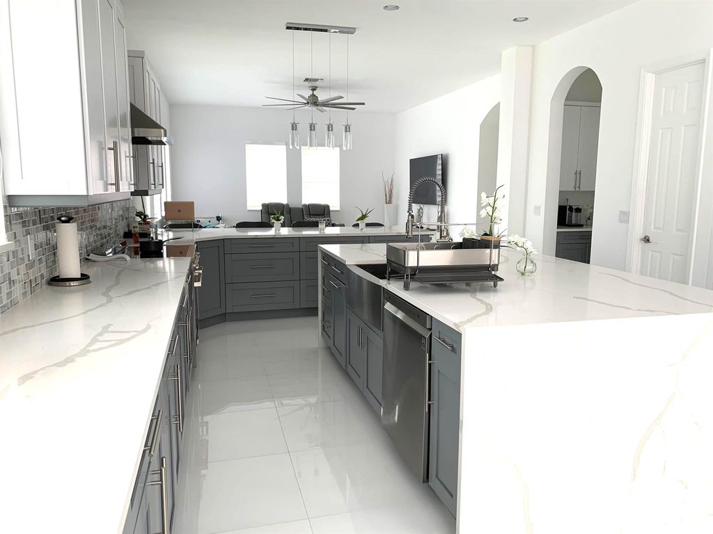 Photo of 506 Cresta Circle, West Palm Beach, FL 33413 (MLS # R10994572)
