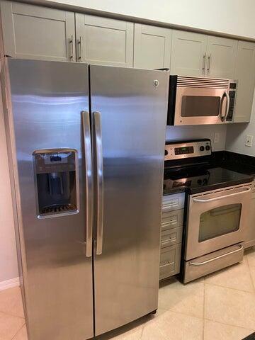 Photo of 6492 Emerald Dunes Drive #303, West Palm Beach, FL 33411 (MLS # R10976049)