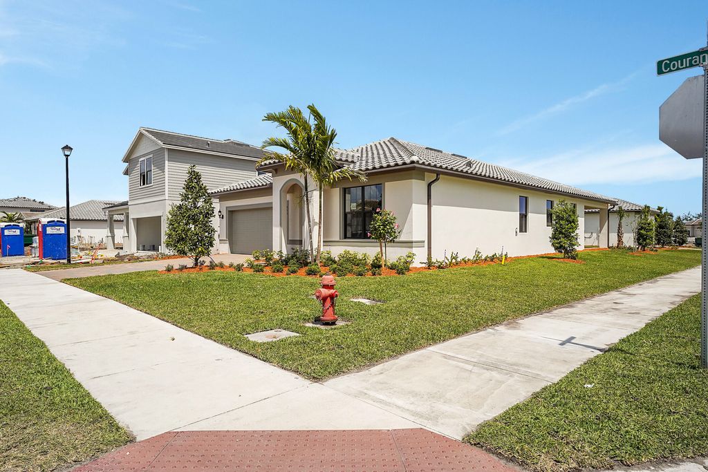 Photo of 845 SE Courances Drive, Port Saint Lucie, FL 34984 (MLS # R11112808)