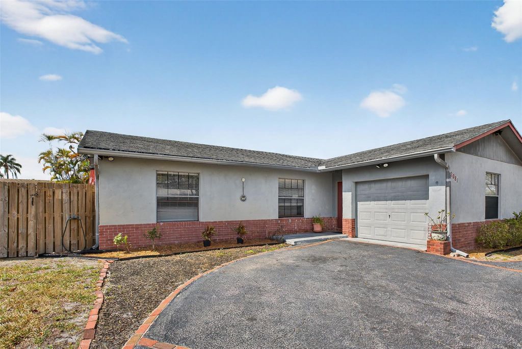 Photo of 2081 NW 107th Terrace, Sunrise, FL 33322 (MLS # F10555539)