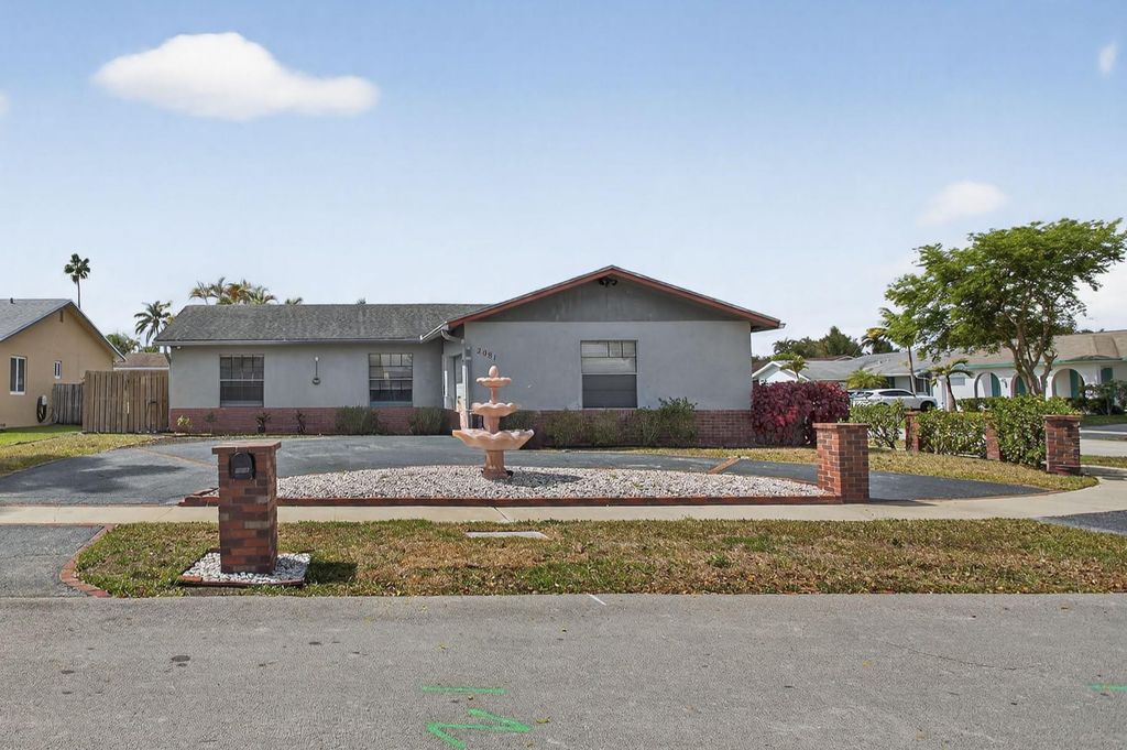 Photo of 2081 NW 107th Terrace, Sunrise, FL 33322 (MLS # F10555539)