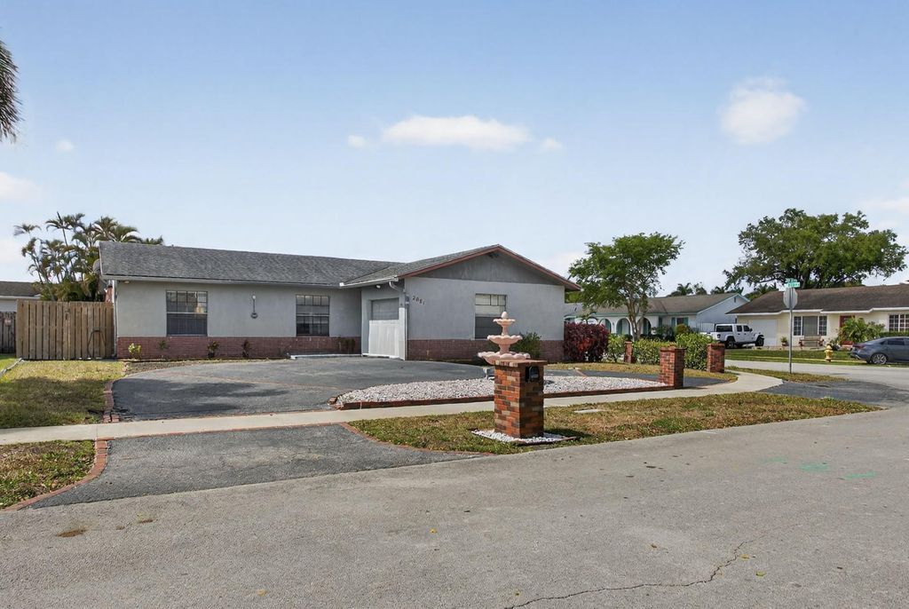 Photo of 2081 NW 107th Terrace, Sunrise, FL 33322 (MLS # F10555539)