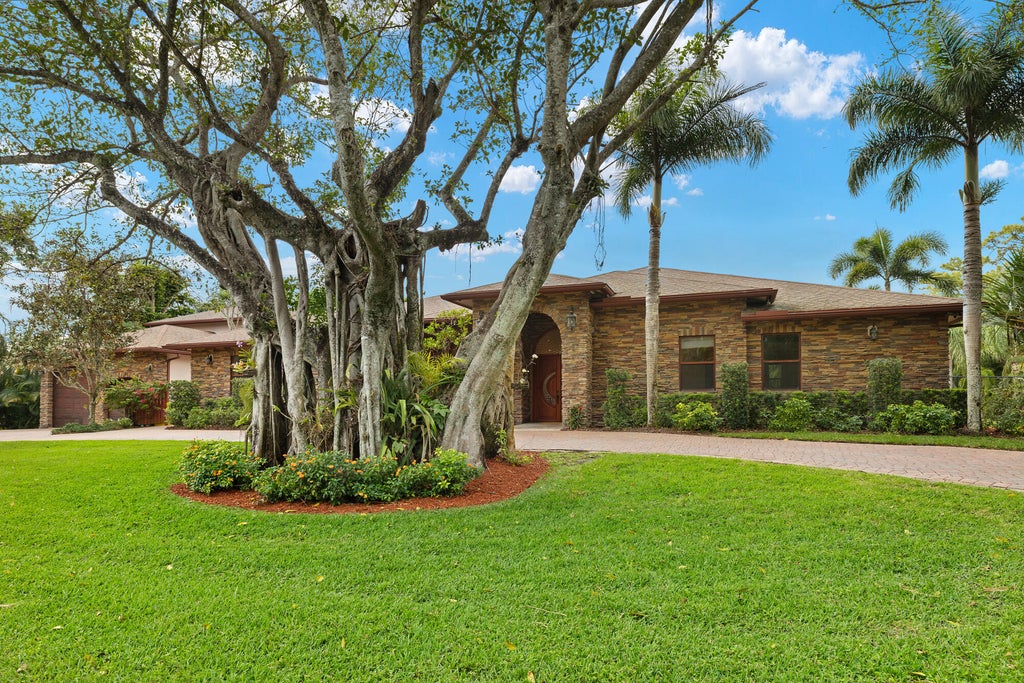 Photo of 265 Westwood Circle E, West Palm Beach, FL 33411 (MLS # R11070951)