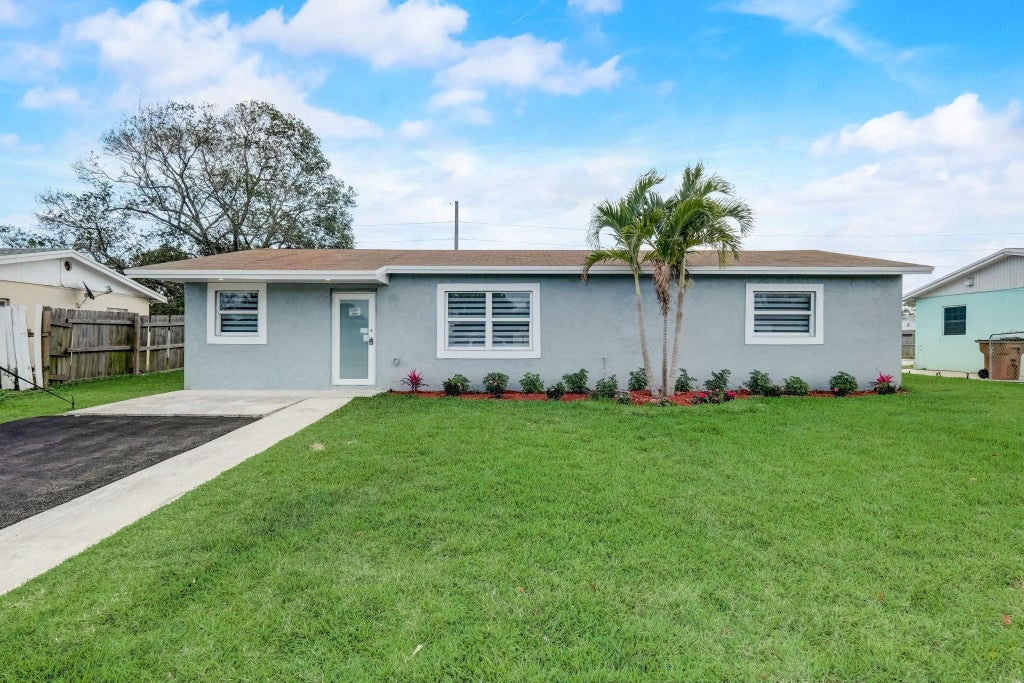 Photo of 520 SW 13th Place, Deerfield Beach, FL 33441 (MLS # F10442786)