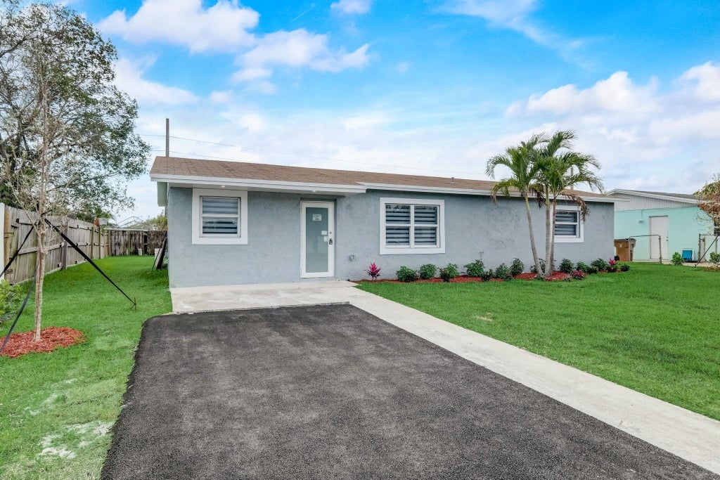 Photo of 520 SW 13th Place, Deerfield Beach, FL 33441 (MLS # F10442786)