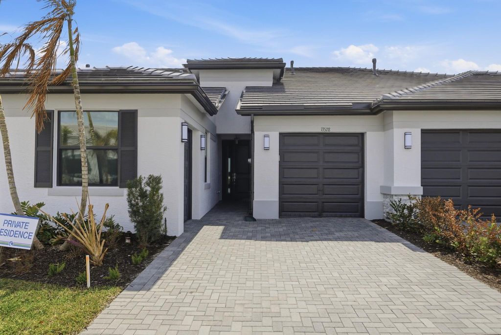 Photo of 13528 SW Starkissed Lane, Port Saint Lucie, FL 34987 (MLS # F10554423)