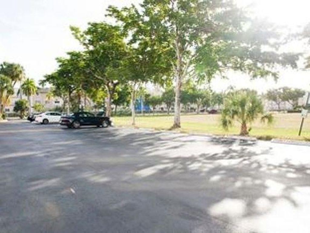 Photo of 300 Layne Blvd #215, Hallandale Beach, FL 33009 (MLS # F10533238)