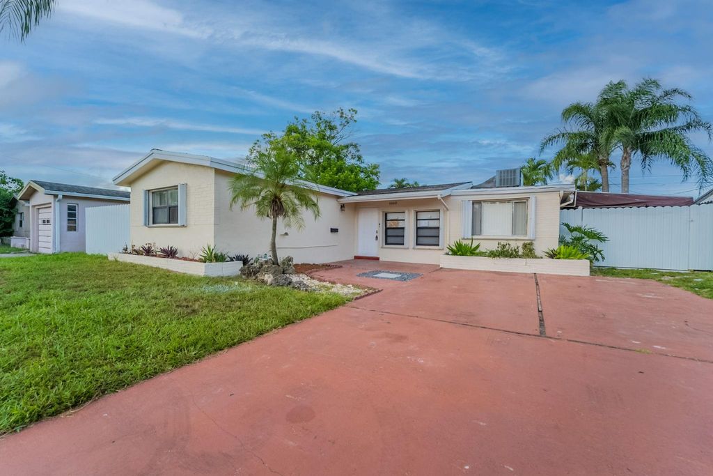 Photo of 6660 Allen St, Hollywood, FL 33024 (MLS # F10511046)