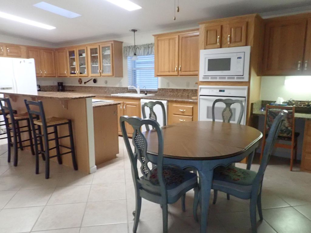 Photo of 3033 Five Iron Drive, Port Saint Lucie, FL 34952 (MLS # R10965200)
