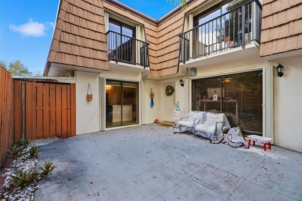 Photo of 9142 SW 23rd Street #D, Davie, FL 33324 (MLS # F10544264)