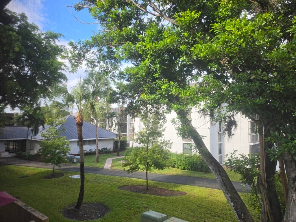 Photo of 8425 Forest Hills Drive #205, Coral Springs, FL 33065 (MLS # B26078544)