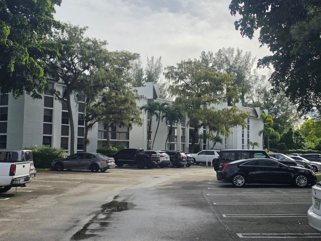 Photo of 8425 Forest Hills Drive #205, Coral Springs, FL 33065 (MLS # B26078544)