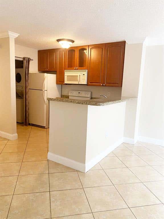 Photo of 1721 Village Boulevard #107, West Palm Beach, FL 33409 (MLS # R10735289)