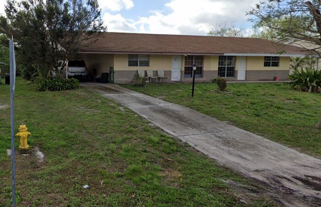 Photo of 52 SE Cayuga Terrace, Stuart, FL 34997 (MLS # R10937734)