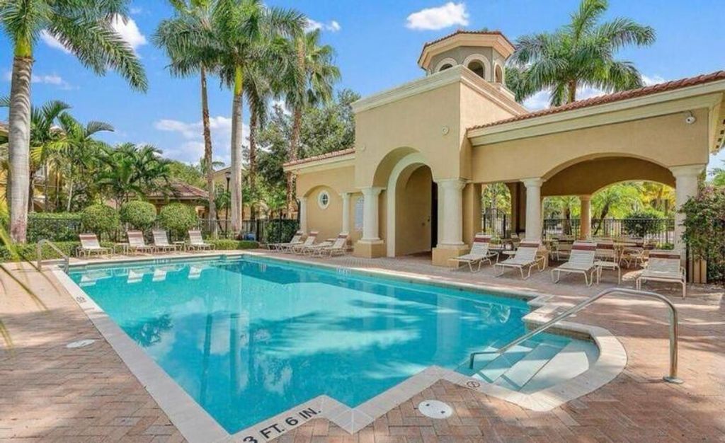 Photo of 4971 Bonsai Circle #209, Palm Beach Gardens, FL 33418 (MLS # R11001126)