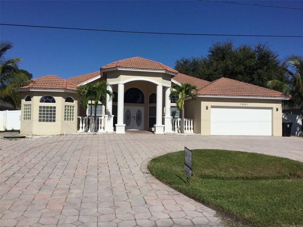 Photo of 1901 SW Notre Dame Avenue, Port Saint Lucie, FL 34953 (MLS # F10479369)